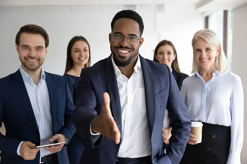 Real estate agent talking to a local business owner