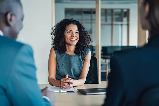 Real estate agent discussing a deal with a client