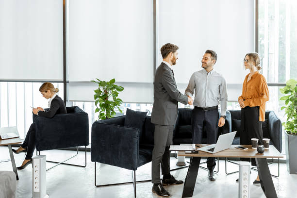 A modern real estate office with a sleek design and comfortable seating area